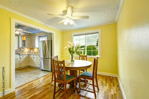 Bright yellow dining room