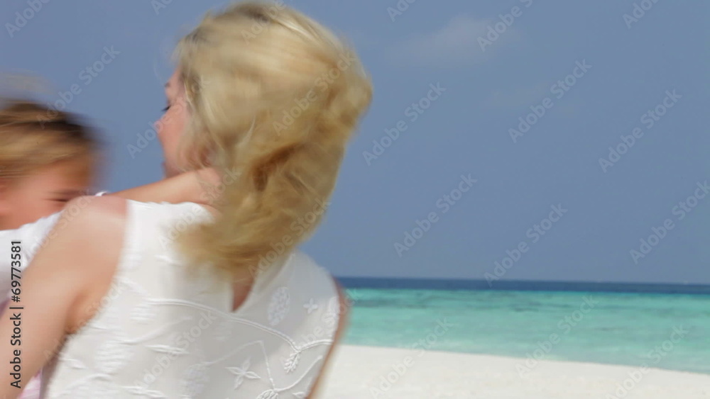 Mother Spinnning Daughter Around On Beautiful Beach Mother Spinnning Daughter Around On Beautiful Beach