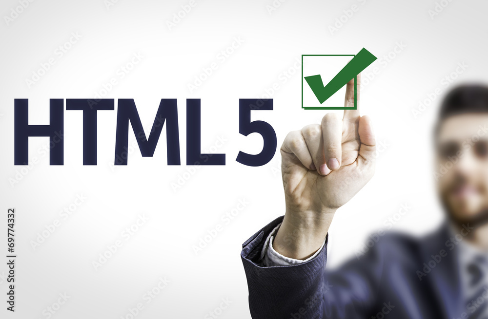 Fototapeta premium Business man pointing the text: HTML 5