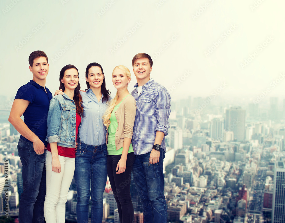 Fototapeta premium group of smiling students standing