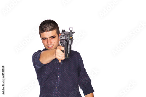 Young man holding gun