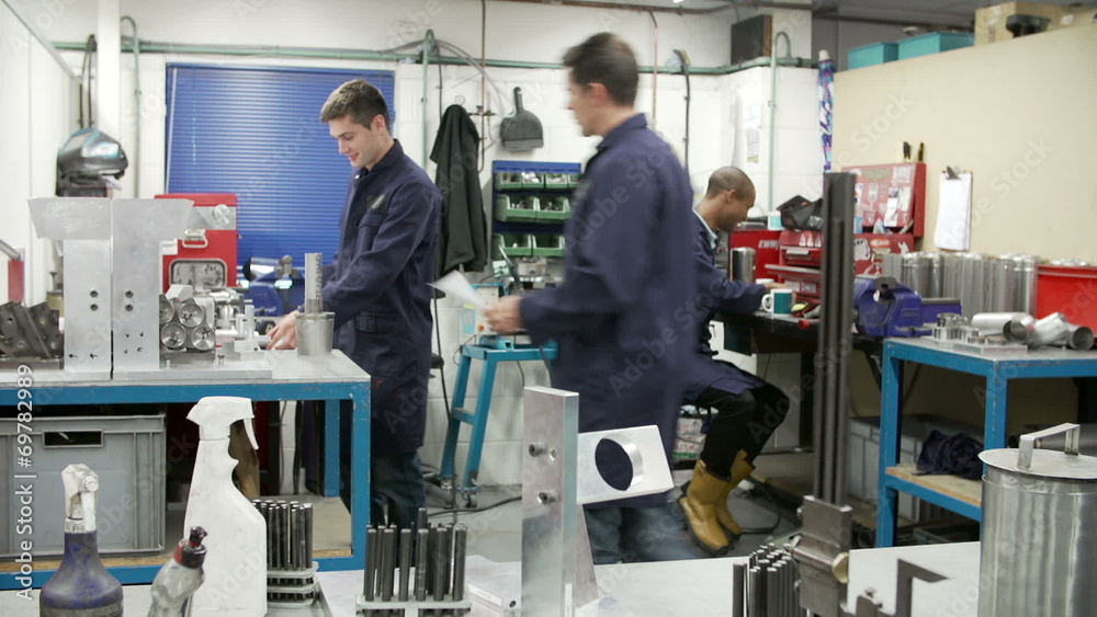 Time Lapse Sequence Of Busy Engineering Workshop Time Lapse Sequence Of Busy Engineering Workshop