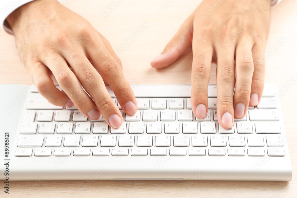 Man working with keyboard Man working with keyboard