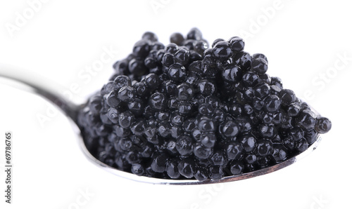 Black caviar in spoon isolated on white