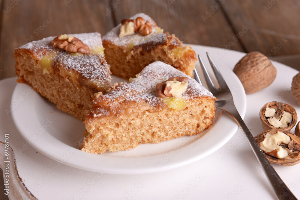 Pieces of delicious cake with nuts Pieces of delicious cake with nuts