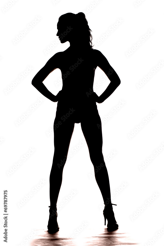 silhouette of the whole body of a young pretty woman Stock Photo