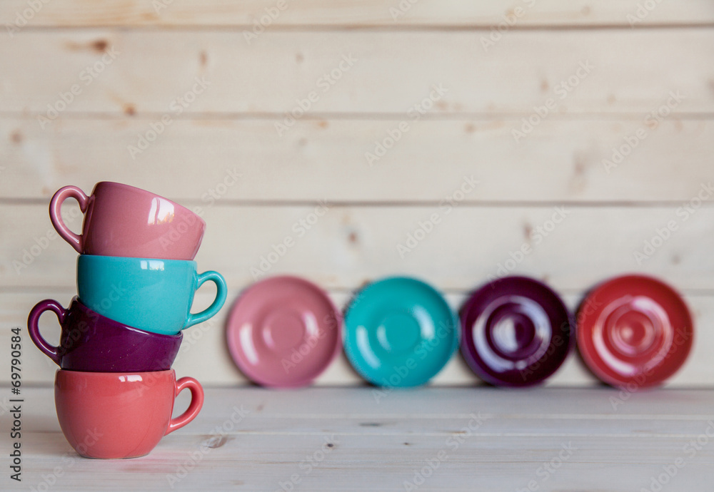 Bright dishes on table on a wooden background Bright dishes on table on a wooden background