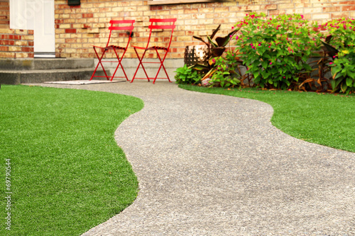 Way with perfect grass landscaping with artificial grass