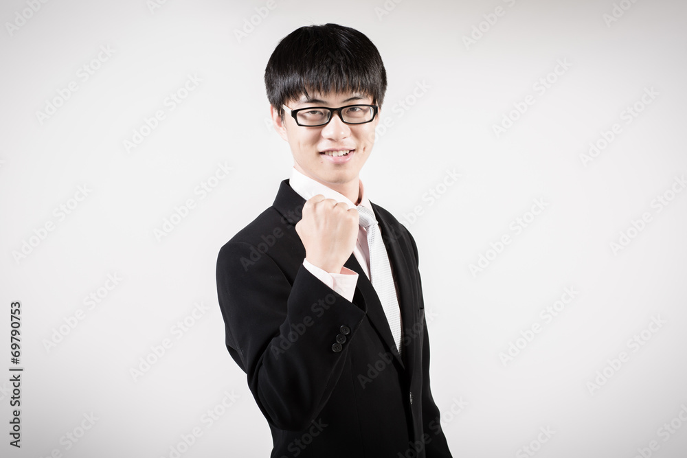 Successful young business man of Asian, full length portrait iso Successful young business man of Asian, full length portrait iso