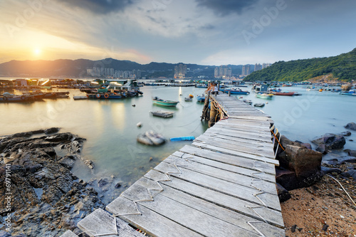 Foto Boat pier at sunset