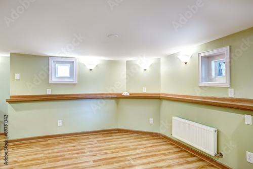 Empty dining area in soft mint color. Mother-in-law apartment in