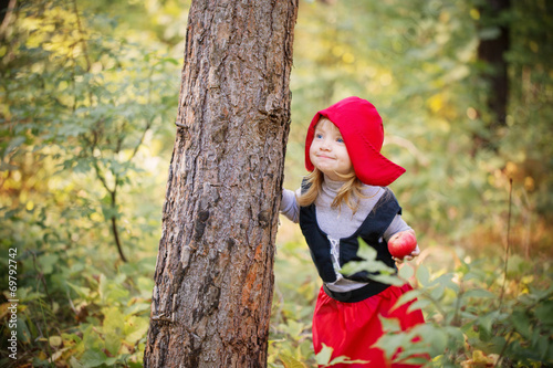 Little Red Riding Hood in the woods © Maya Kruchancova