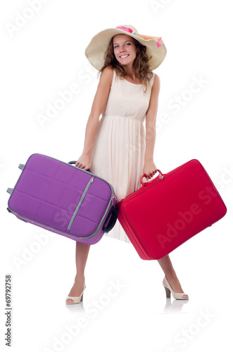 Woman traveller with suitcase isolated on white