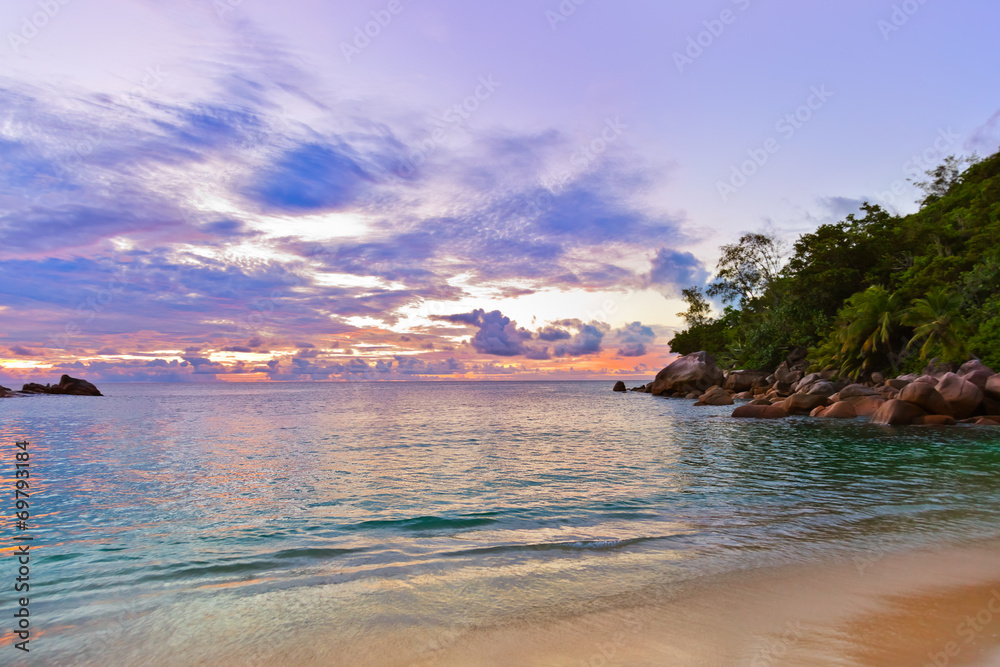 Seychelles tropical beach at sunset