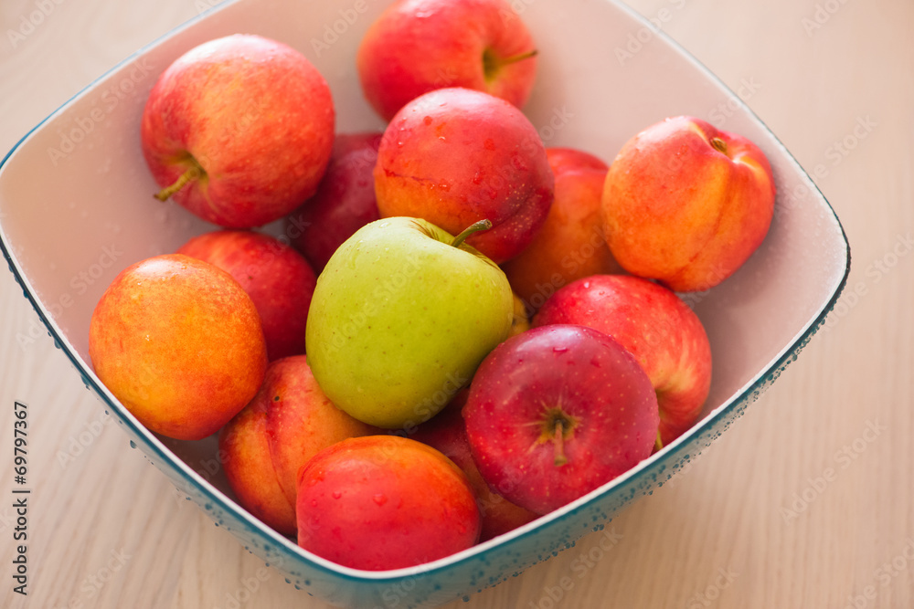 Fruits in the bown on table Fruits in the bown on table