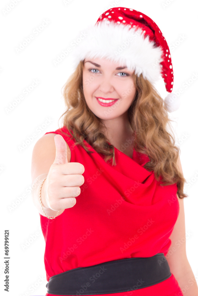 young woman in santa hat thumbs up isolated on white young woman in santa hat thumbs up isolated on white
