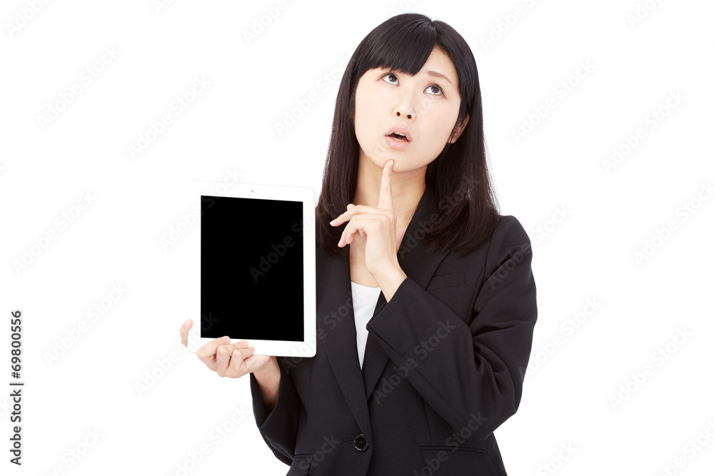 タブレットを持って考えるビジネスウーマン タブレットを持って考えるビジネスウーマン