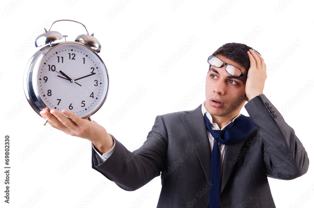 Man with clock afraid to miss deadline isolated on white Man with clock afraid to miss deadline isolated on white