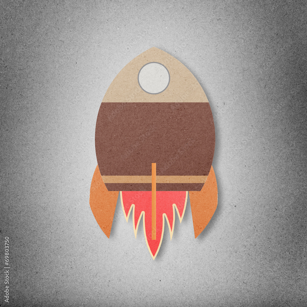 Fototapeta premium Space rocket flying in space cut paper craft on paper background