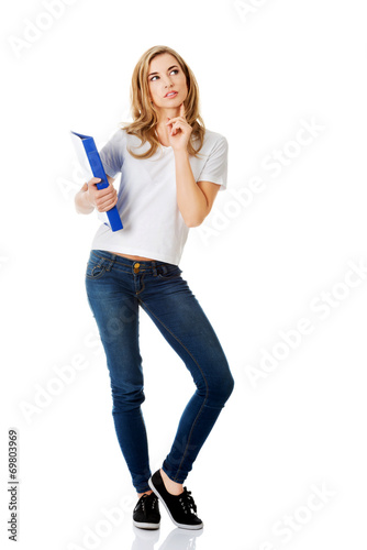 Young student woman thinking