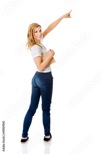 Student woman showing copyspace