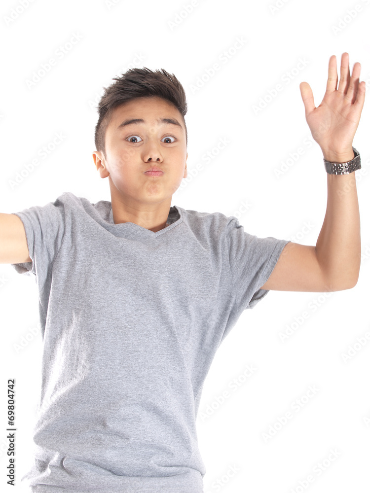 multiracial boy wearing t-shirt and sporting a new haircut jumping multiracial boy wearing t-shirt and sporting a new haircut jumping