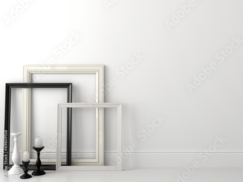 Classic black and white frames on white wall