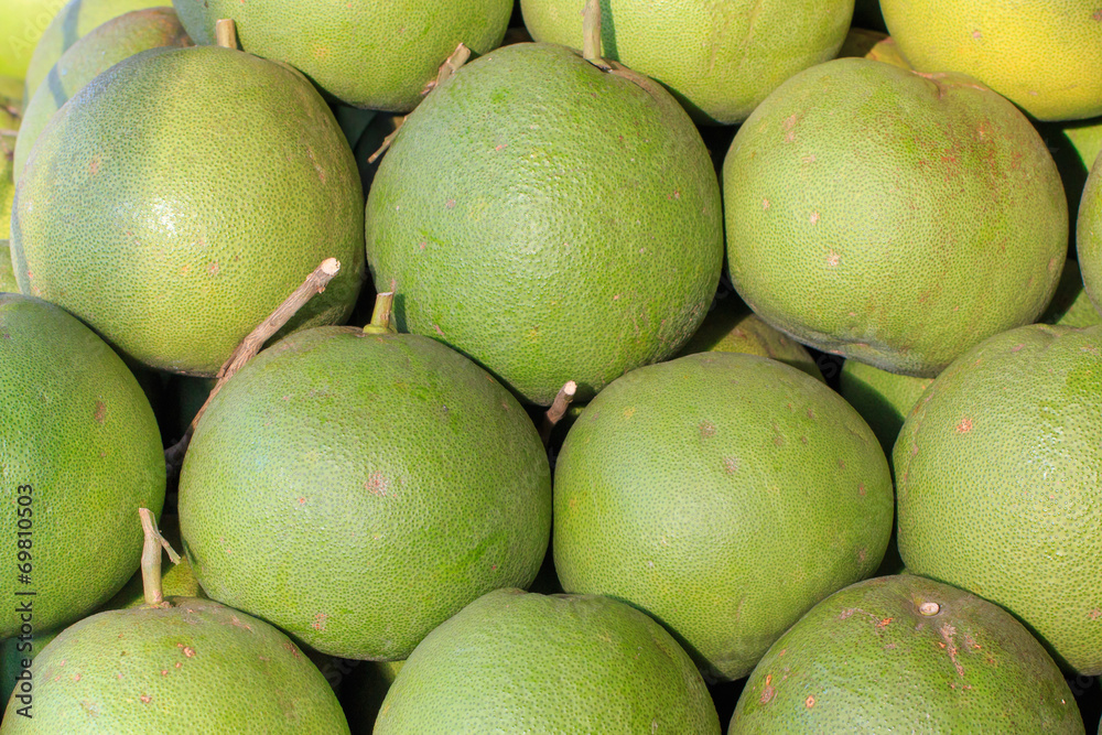 Green grapefruit at market.