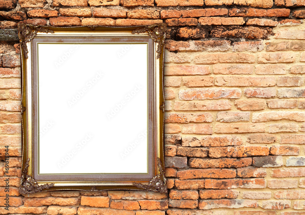 Fototapeta premium blank golden frame on brick stone wall