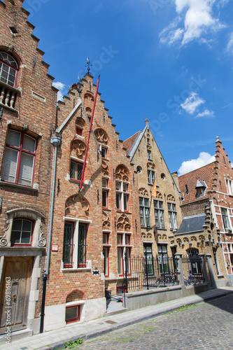 Bruges - Typicaly old brick houses on Moerstraat street photo