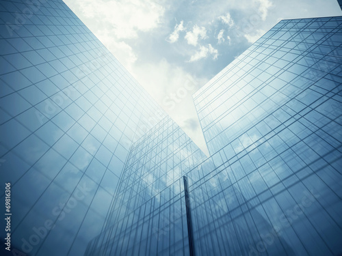 Blue glass wall of skyscraper