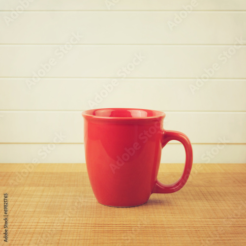 Retro photo of coffee cup in instagram style.