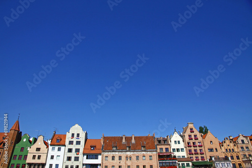 Colourful old buildings with blue sky background in Gdansk