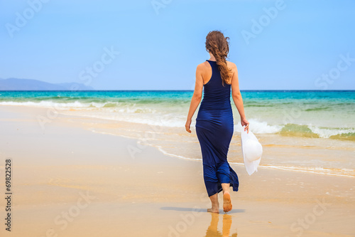 Young woman on ocean beach