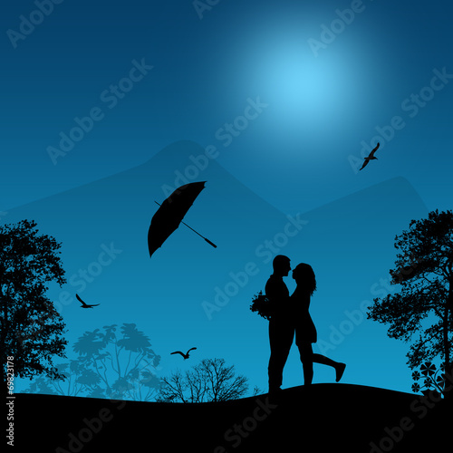 Embraced lovers in a park