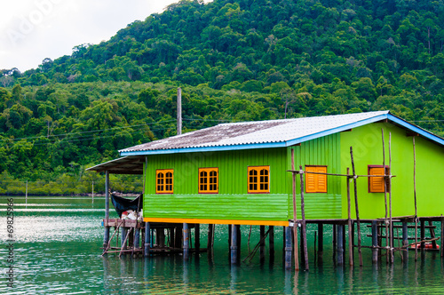 Colorful Traditional Thai house on stilts