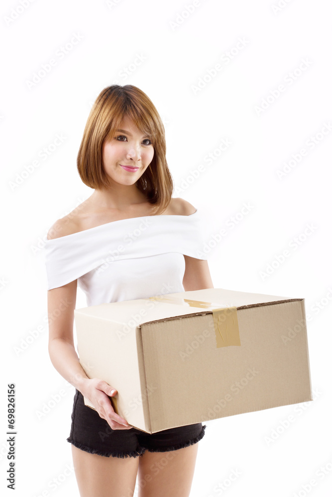 happy, smiling woman carrying carton box for moving concept happy, smiling woman carrying carton box for moving concept