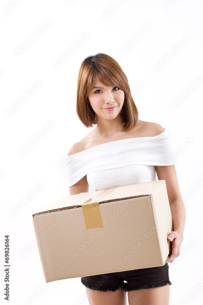 happy, smiling woman carrying carton box for moving concept happy, smiling woman carrying carton box for moving concept