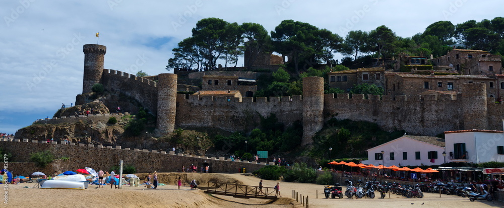 Fototapeta premium Old fortress in Tossa over Playa Grande beach