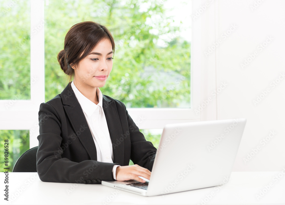 Business woman using computer laptop Business woman using computer laptop