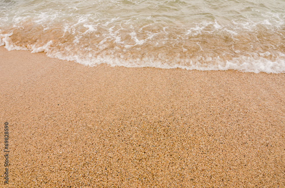 Wave of the sea on sand beach Wave of the sea on sand beach