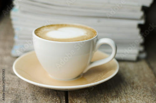 white cup of hot coffee with foamy on top