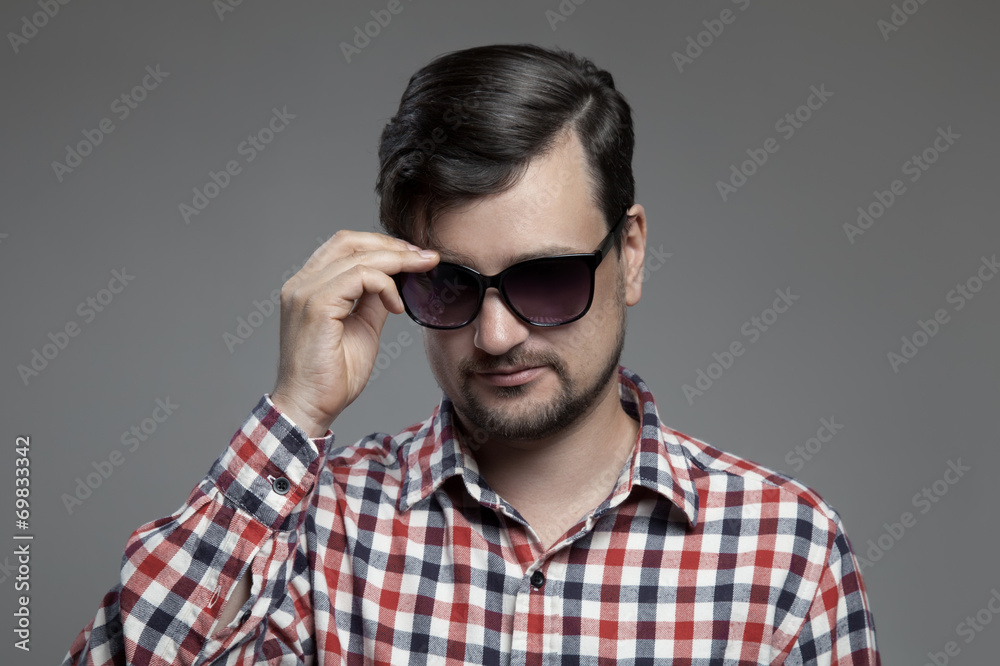 Handsome hipster modern man in sunglasses. Handsome hipster modern man in sunglasses.
