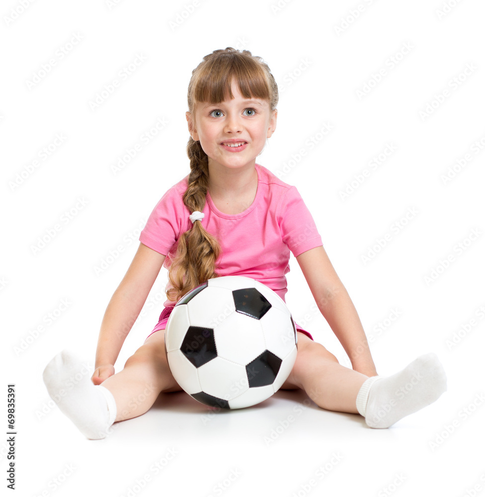 Little girl sitting with soccer ball isolated on white
