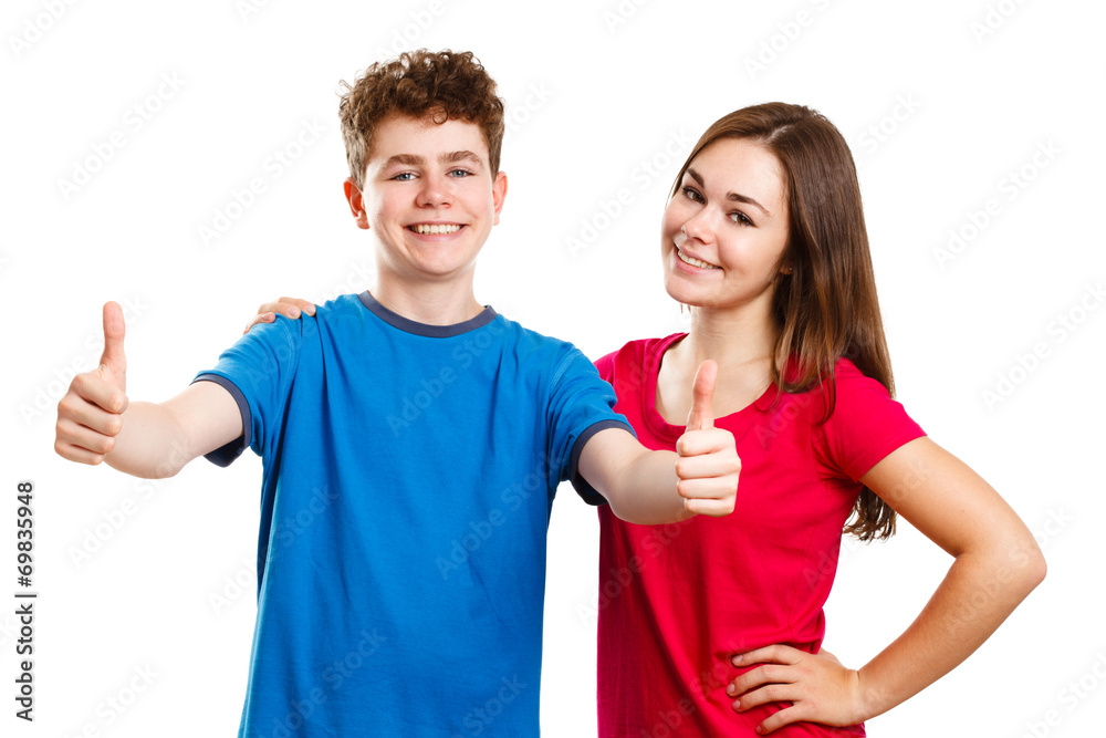 Teenage girl and boy showing OK sign isolated Teenage girl and boy showing OK sign isolated