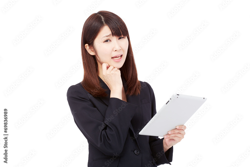 タブレットを持って考えるビジネスウーマン タブレットを持って考えるビジネスウーマン