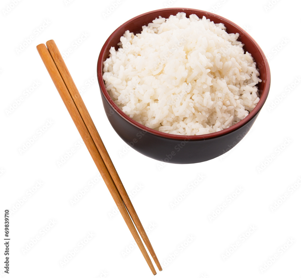 A bowl of rice and a pair of chopstick over white background A bowl of rice and a pair of chopstick over white background