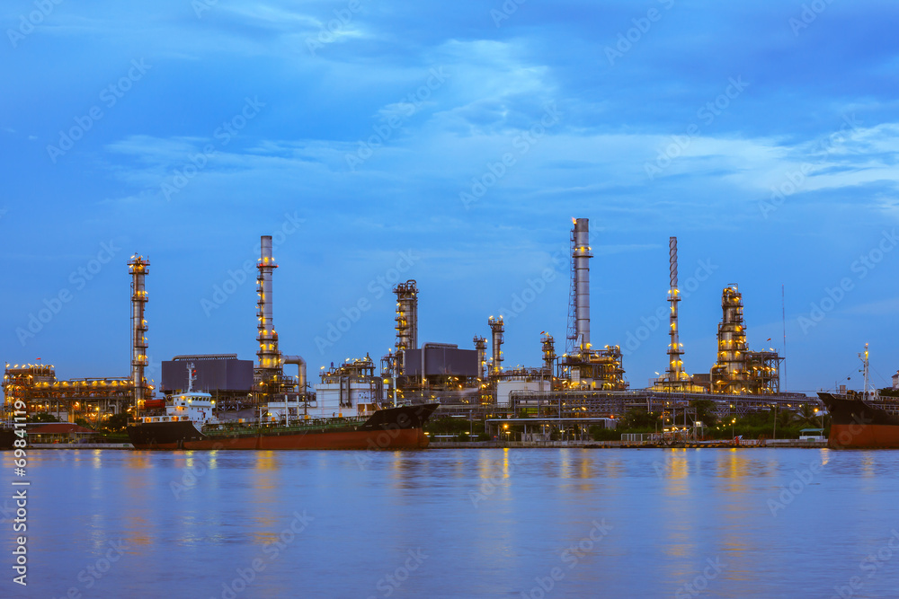 Oil refinery at twilight, business logistic concept