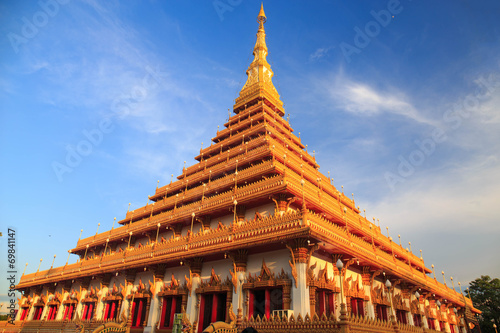 top of golden pagoda at the Thai temple, Khon kaen Thailand photo