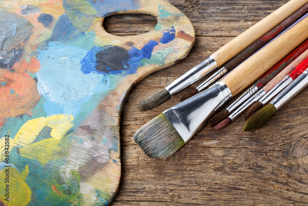 Fototapeta premium Brushes and colorful almost abstract pallet